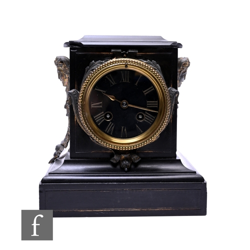 115 - A Victorian slate mantle clock with key, damaged.