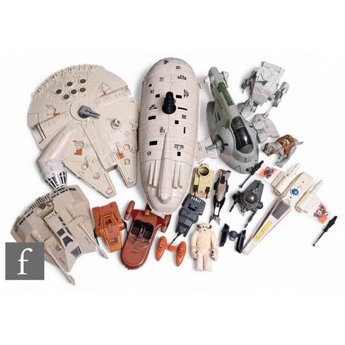 121 - A collection of Kenner Star Wars vehicles and toys, to include Rebel Transport, Millennium Falcon, S... 