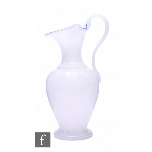 141 - A large Victorian alabaster glass jug, of shouldered ovoid form with applied high loop handle, with ... 