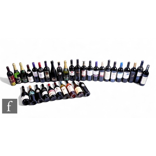 69 - Thirty-three bottles of various wines, including red, white and sparkling wines and perrys. (33)