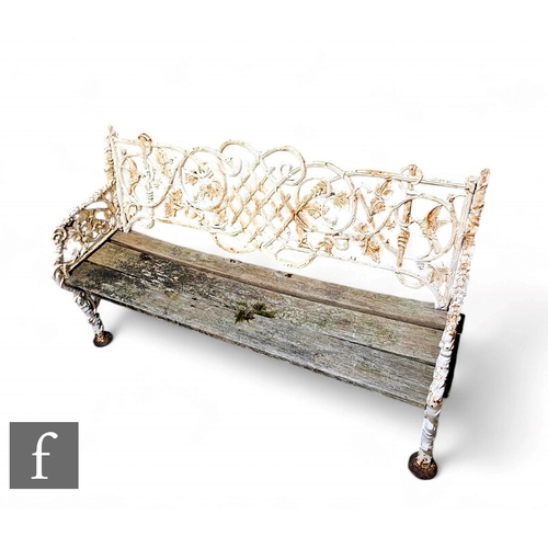 1116 - A 20th Century Coalbrookdale style cast iron three seater garden bench, the pierced back with floral... 