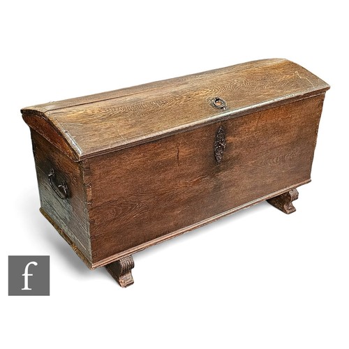 1110 - A large 19th Century continental oak domed blanket/storage chest, two handles, iron fittings with ke... 