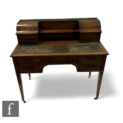 1036 - An Edwardian Carlton House style marquetry inlaid mahogany desk, the double lift up superstructure f... 