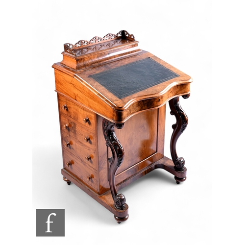 1046 - A Victorian burr walnut Davenport fitted with four drawers to the side below a fitted interior enclo... 