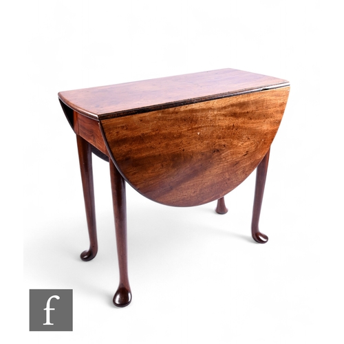 1049 - A George II mahogany oval drop flap table, on slender legs terminating in pad feet, height 70cm x 12... 