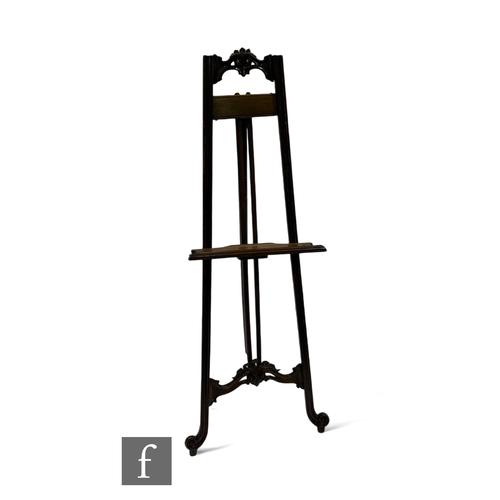 1107 - A 19th Century French carved walnut artist's easel, height 158cm.