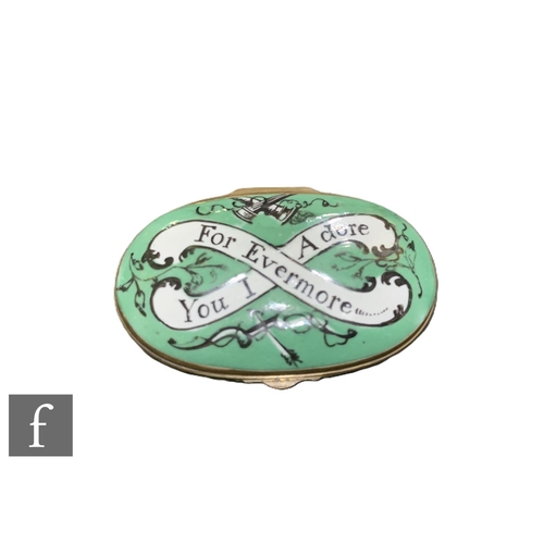 4 - A George III Bilston enamel patch box, circa 1800, of oval form, decorated to the cover with crossed... 