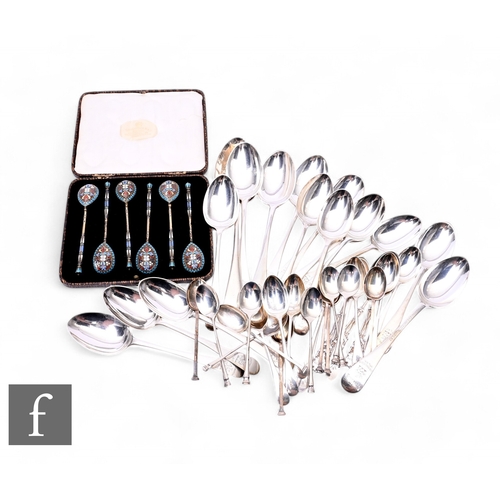 388 - A parcel lot of hallmarked silver flat ware to include table, dessert and tea spoons, with a set of ... 