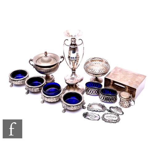 402 - A parcel lot of assorted hallmarked silver and white metal items to include a three piece cruet, dec... 