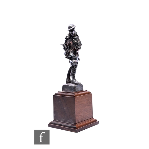 367 - A hallmarked silver study of a World War One soldier mounted to an oak plinth, height 32cm, Sheffiel... 