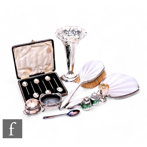 440 - A parcel lot of assorted hallmarked silver and white metal items to include a hand mirror and brush,... 