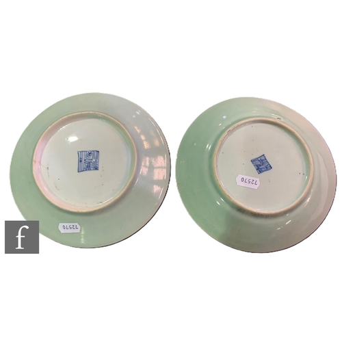 531 - A collection of 19th Century Chinese celadon ground famille rose dishes, all similarly decorated wit... 