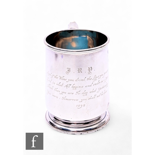 406 - A hallmarked Victorian silver tankard by Lambert & Co, London 1897, of tapered sleeve form on st... 