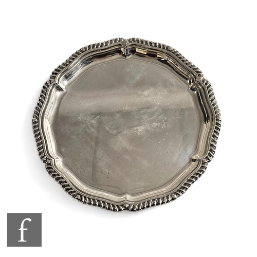 409 - A George V hallmarked silver waiter by William Hutton & Sons Ltd, gadrooned scalloped border, 12... 