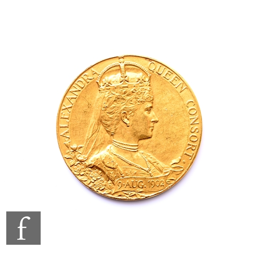 713 - Medallion - An Edward VII gold coronation medallion, London 1902, circular medallion, the obverse wi... 