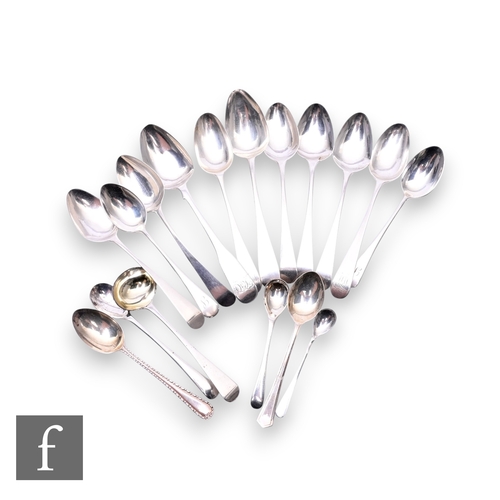 415 - A collection of hallmarked silver spoons, George III and later, including teaspoons, mustard and sal... 