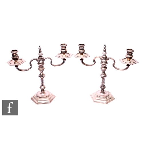 457 - A pair of 20th Century silver twin light candelabra in the Queen Anne style, with scroll branches ov... 