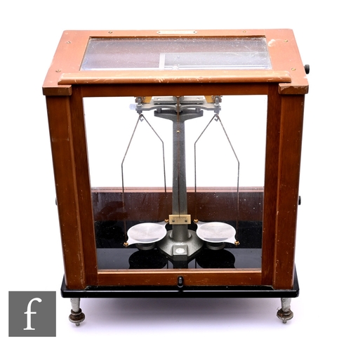 722 - A set of chemist's balance scales by Stanton & Co London, in wooden framed and glazed case, widt... 