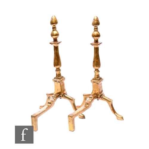 763 - A pair of brass finial andirons on splayed legs, height 45cm. (2)