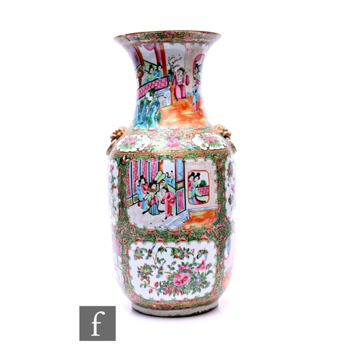 504 - A late 19th Century Chinese Canton famille rose vase of baluster form, rising to a flared rim, the b... 