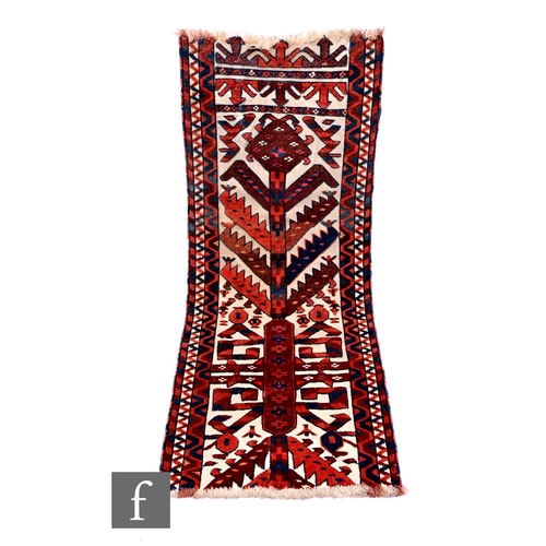 553 - A 19th Century Turkoman Yomud tent band fragment, finely woven in red and blue, 115cm x 42cm. NB - T... 