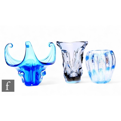 204 - Three mid Century Murano glassware, to include a ribbed glass vase of ovoid form with trailed blue a... 