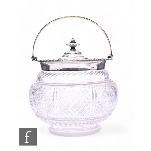 465 - An Edwardian silver mounted cut glass biscuit barrel of swollen footed form, with strawberry diamond... 