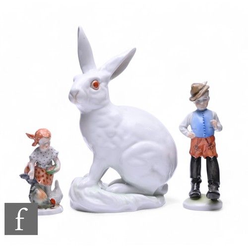 38 - A Herend Hungarian porcelain rabbit, modelled sitting with perked ears, white glazed with salmon pin... 