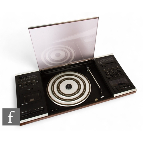 134 - A Bang & Olufsen Beocenter 2002 turntable with tape deck, together with a pair of Bang & Olu... 