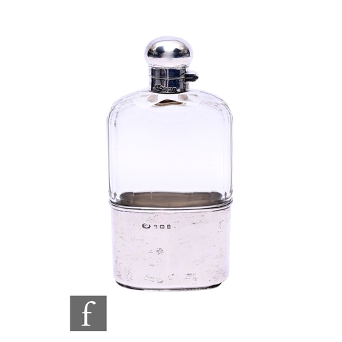 516 - An Edwardian silver mounted cut glass hip flask, with bayonet twist cap and removable cup base, heig... 