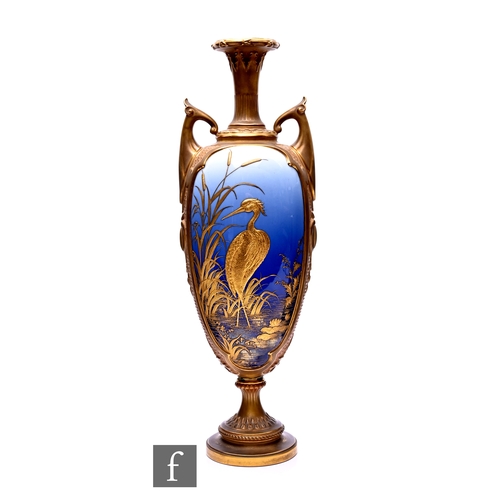 43 - A Royal Worcester shot enamel vase, circa 1900, of elongated ovoid form with twin angular foliate mo... 