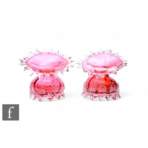 302 - A pair of Victorian ruby glass vases, compressed spherical form with wide 'Jack in the Pulpit' style... 