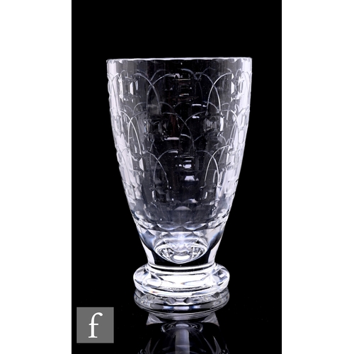 310 - A 20th Century Webb Corbett cut glass vase, of footed flared form, cut with bowed lines uniting pris... 