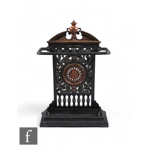 822 - A late 19th Century Coalbrookdale style aesthetic cast iron umbrella stand, pierced roundel and leaf... 