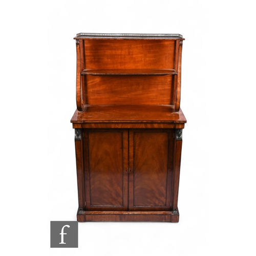 845 - A late Regency period mahogany chiffonier of small proportions in the Egyptian taste, with two tier ... 