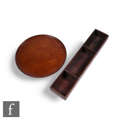 846 - A late 19th to early 20th Century mahogany serving tray of circular form with thumb-moulded edge, di... 