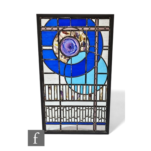 458 - A contemporary George Jackson stained glass panel of an abstract design of graduated circles above b... 