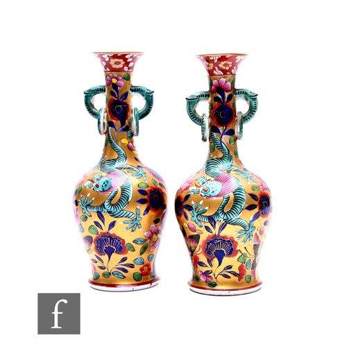 88 - A pair of early 19th Century Miles Mason vases, of inverse baluster form with high drawn neck and ev... 