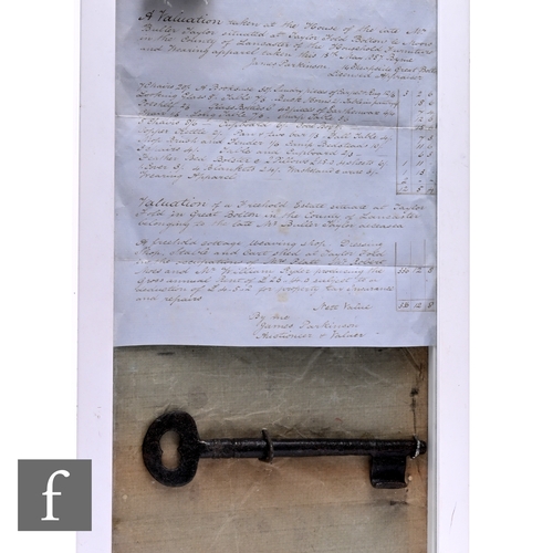 585 - A 19th century iron key with an ink indenture written on pale blue paper for a Freehold Estate in Bo... 