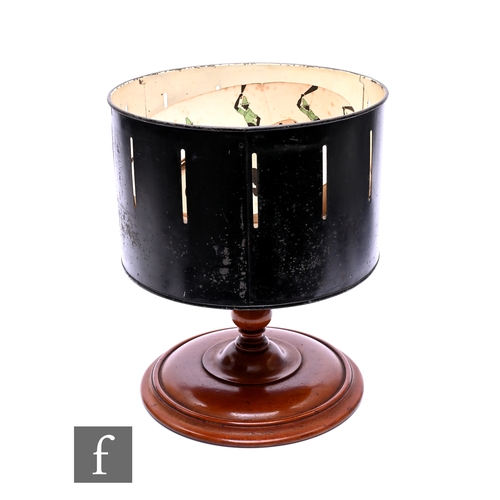 588 - A 19th century Zoetrope or 'Wheel of Life' on turned mahogany base with original animated cards cont... 