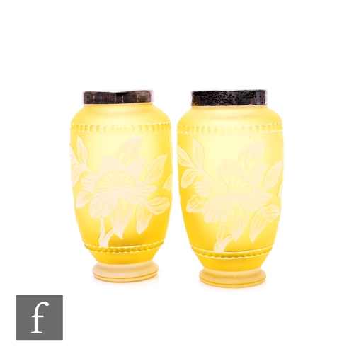 380 - A pair of late 19th Century cameo glass vases, of elongated ovoid form with plated short drawn colla... 