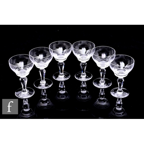 430 - A set of six Stuart Crystal R.M.S Queen Elizabeth sherry glasses, ogee wave cut bowls, on facet cut ... 