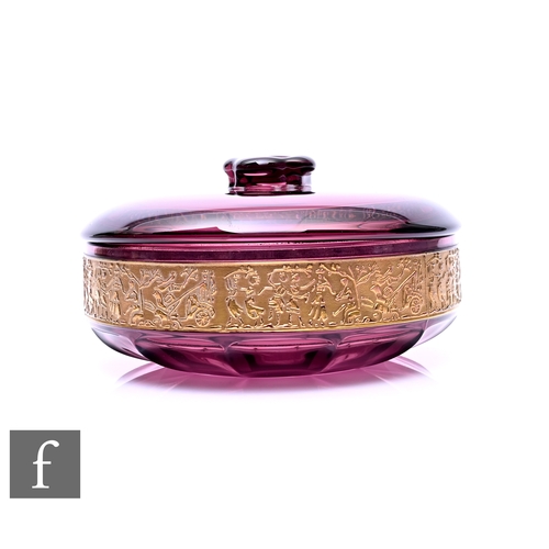 431 - An amethyst glass bowl and cover in the manner of Moser Karlsbad, circa 1920, of circular form, deep... 