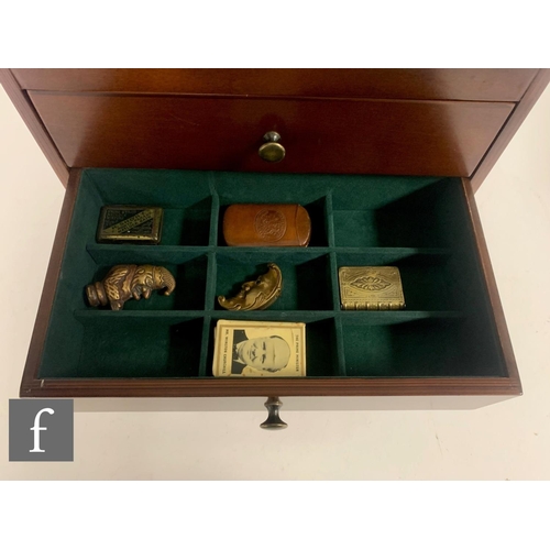 599 - A collection of 19th and 20th Century vesta cases to include brass novelty examples, Man in the Moon... 