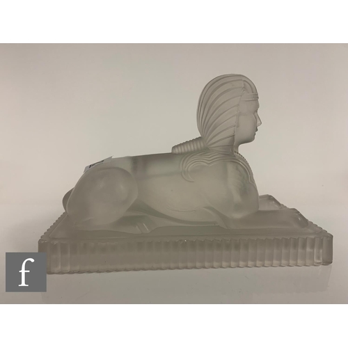 278 - A Molineaux, Webb & Co pressed glass figure of an Egyptian Sphinx circa 1875, the rectangular pl... 