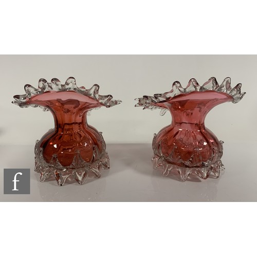 302 - A pair of Victorian ruby glass vases, compressed spherical form with wide 'Jack in the Pulpit' style... 