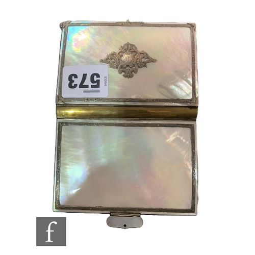 573 - A 19th century mother of pearl card case, mounted with a silver cartouche within a banded border.