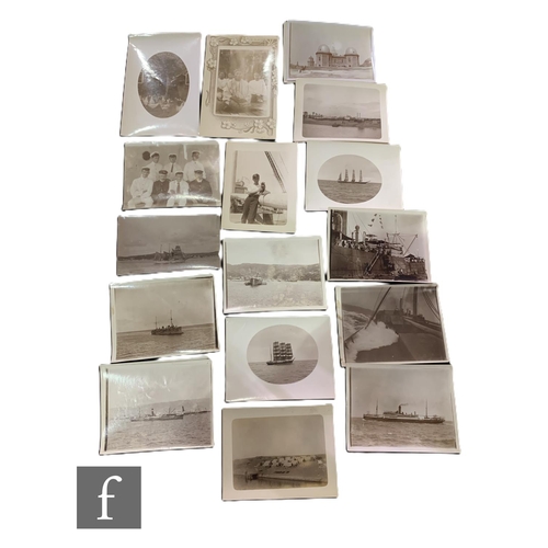 592 - A collection of early black and white photographs to include shipping voyages to South America, Subm... 