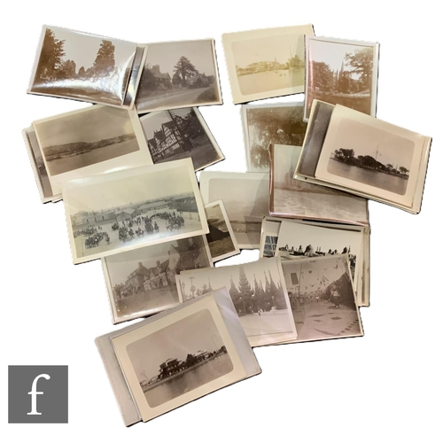 592 - A collection of early black and white photographs to include shipping voyages to South America, Subm... 