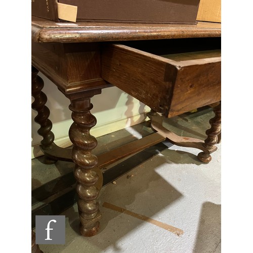 874 - An 18th Century oak side table, fitted with a single frieze drawer above bulbous barley twist turned... 